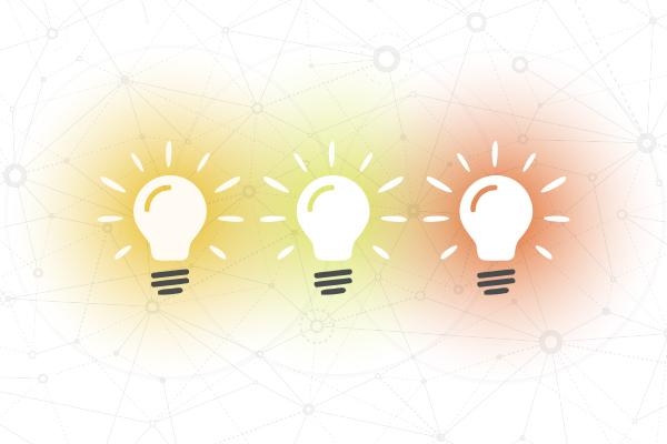 Illustration of lightbulbs emitting an array of different colors