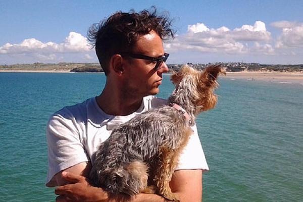 Photo: Dr. Daniel Redhead, holding small dog