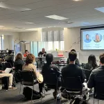 Group of people viewing a presentation