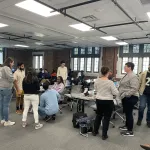 People talking in the audience 